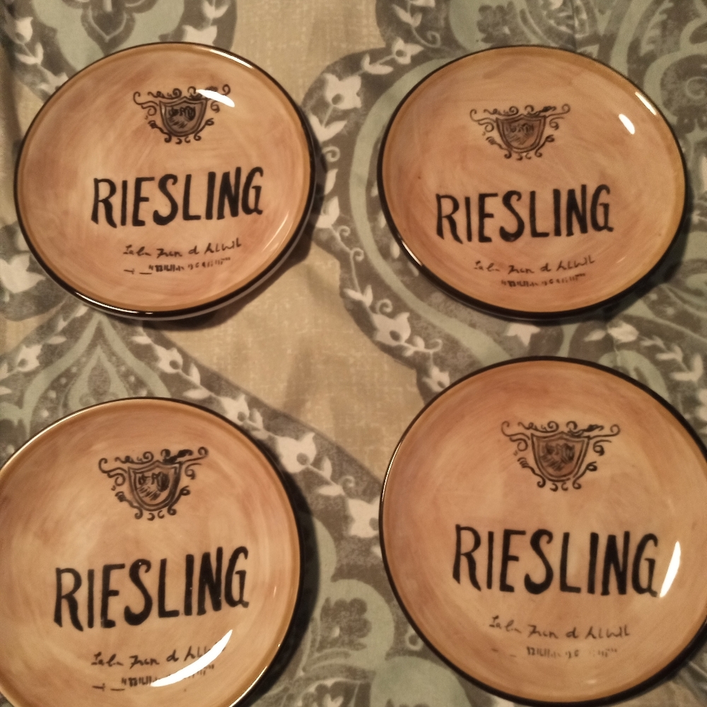 Set of four small plates